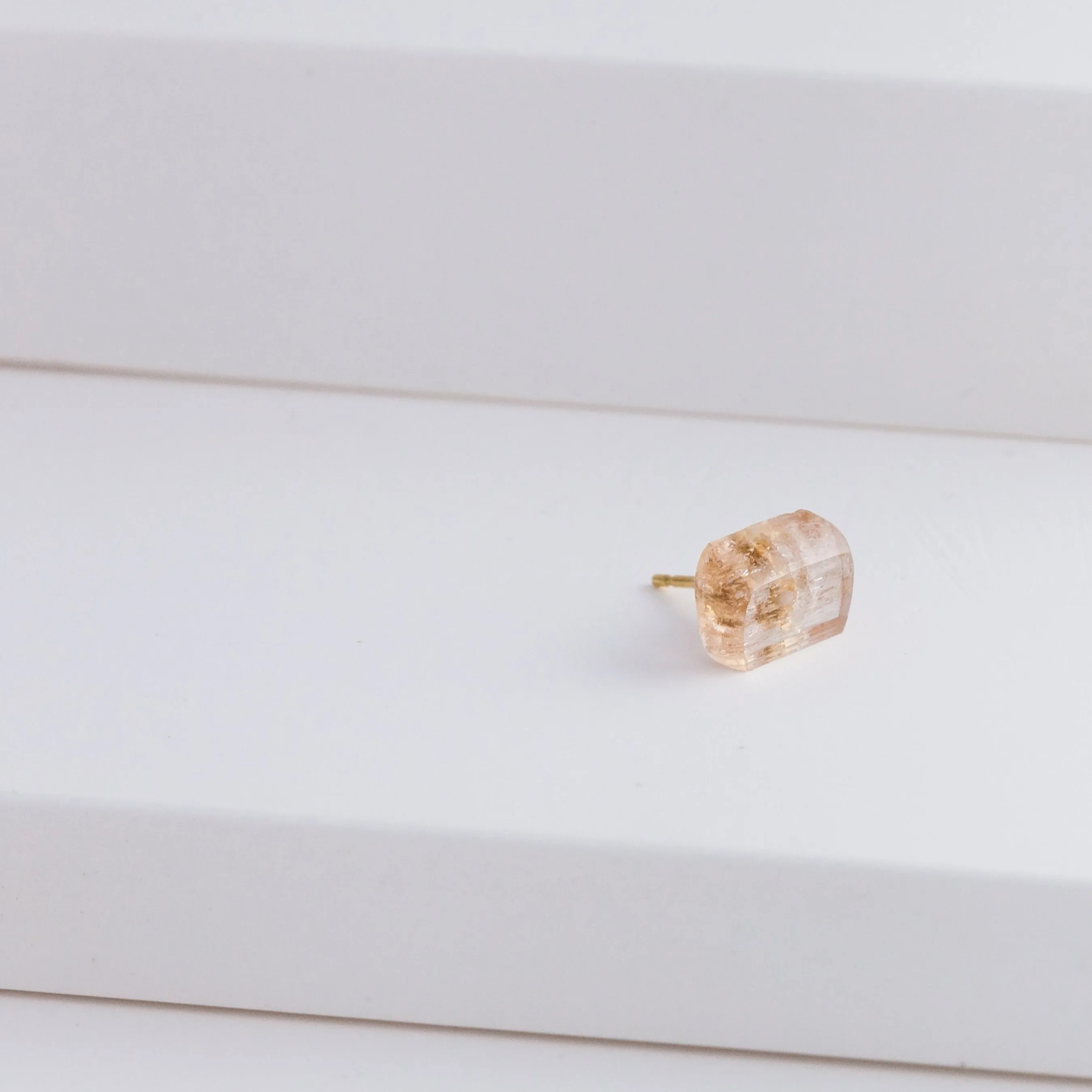 Rough stone imperial topaz stud